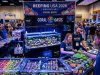 Reefing USA 2026 coral expo vendor booth in Nashville with colorful coral frags on display