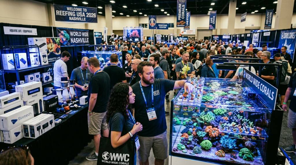 Reef aquarium enthusiasts browsing coral tanks and equipment at Reefing USA 2026 Nashville