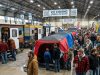 Anglers browsing fish houses and ice shelters at the St. Paul winter sports show